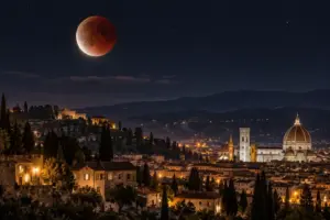 Luna in eclissi sopra un tipico paesaggio e architettura italiana.