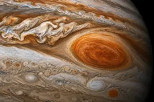 Primo piano ravvicinato delle nubi e delle tempeste atmosferiche del pianeta Giove.